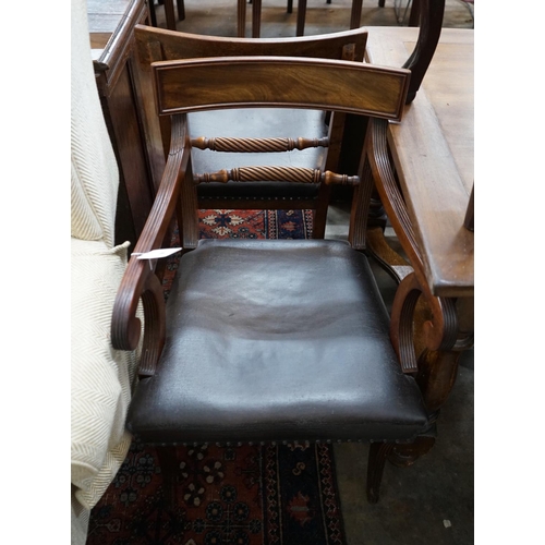 1086 - A set of eight Regency mahogany dining chairs, two with arms