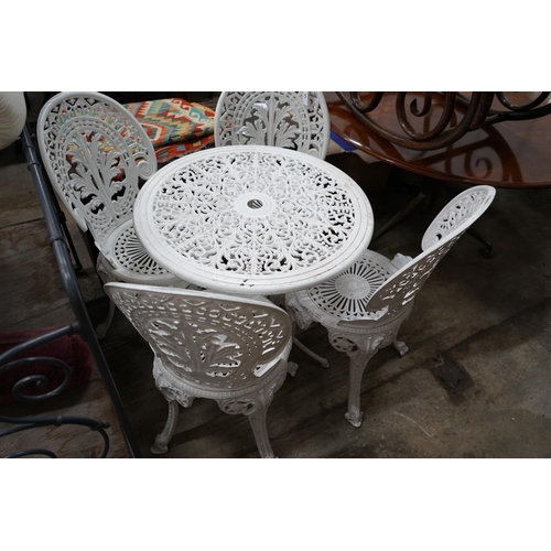 1091 - A Victorian style painted aluminium garden table and four chairs, table diameter 68cm height 65cm... 