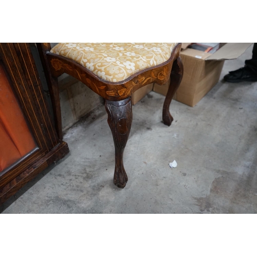 1100 - An early 18th century Dutch walnut and floral marquetry dining chair