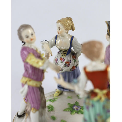 104 - A Meissen group of four dancing children, early 20th century, blue crossed swords mark and incised m... 