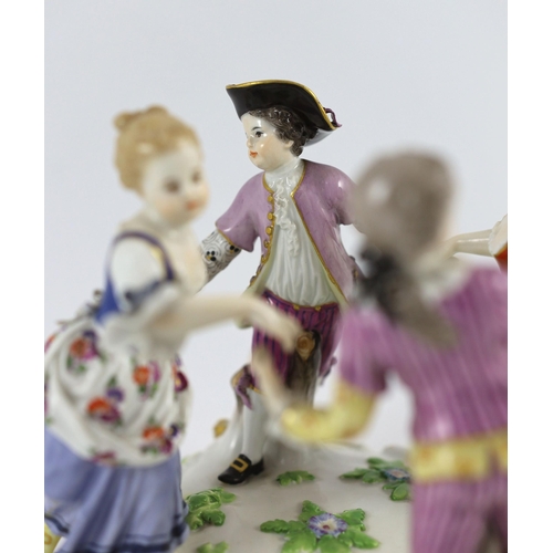 104 - A Meissen group of four dancing children, early 20th century, blue crossed swords mark and incised m... 