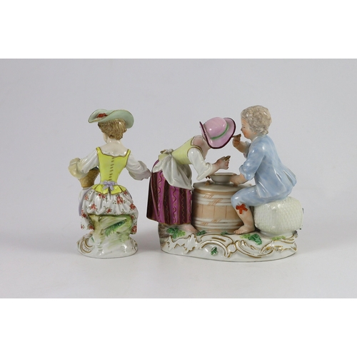 107 - A Meissen group of two children eating from a bowl, dot period and a Meissen figure of a flower girl... 