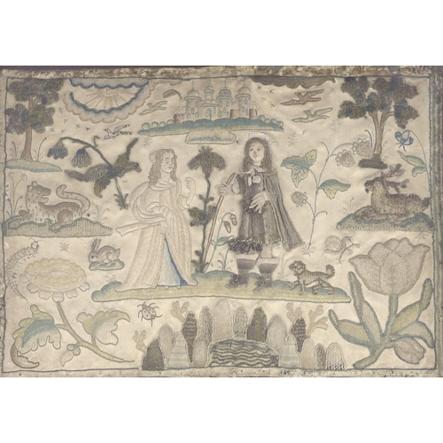 12 - A 17th century English stumpwork panel, depicting a noble couple with castle beyond, leopard and sta... 