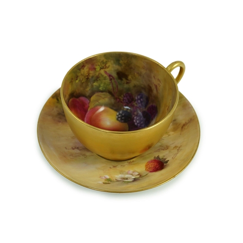 121 - A Royal Worcester fruit painted tea cup and saucer, date code for 1925/6, the interior of the cup pa... 