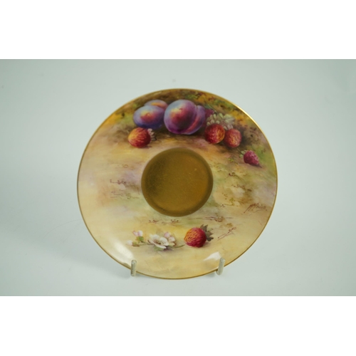 121 - A Royal Worcester fruit painted tea cup and saucer, date code for 1925/6, the interior of the cup pa... 