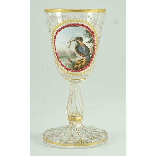 128 - A Bohemian enamelled glass Kingfisher goblet, late 19th century, enamelled to an oval white glass ... 