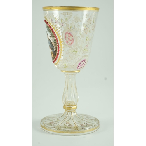 128 - A Bohemian enamelled glass Kingfisher goblet, late 19th century, enamelled to an oval white glass ... 