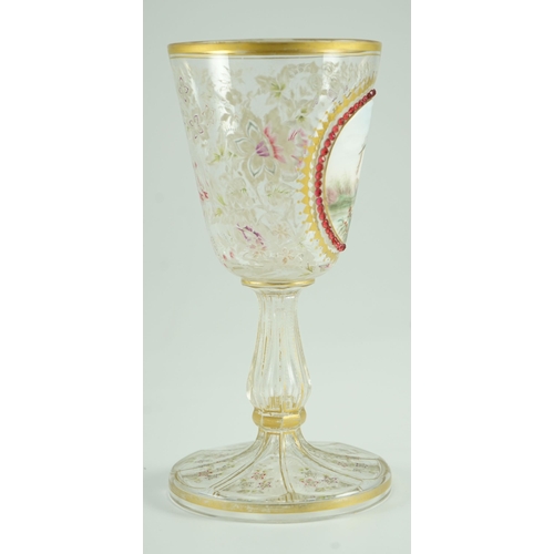 128 - A Bohemian enamelled glass Kingfisher goblet, late 19th century, enamelled to an oval white glass ... 