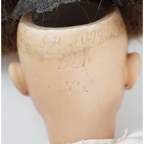 13 - A Simon & Halbig bisque Oriental doll, 1099, original wig and body, missing one finger, height 46cm... 