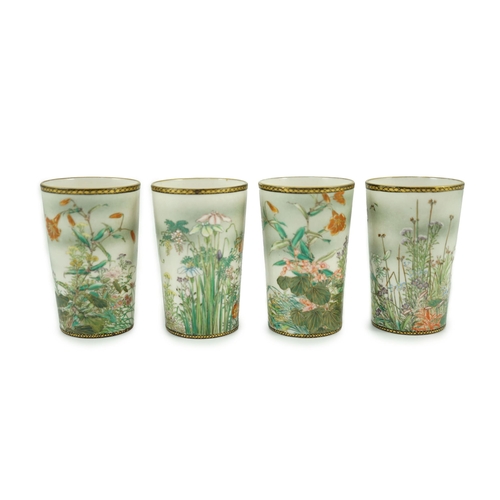 130 - A set of four Japanese porcelain small cups, by Kinkozan, Meiji period, finely painted in Satsuma st... 