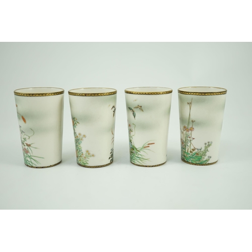 130 - A set of four Japanese porcelain small cups, by Kinkozan, Meiji period, finely painted in Satsuma st... 