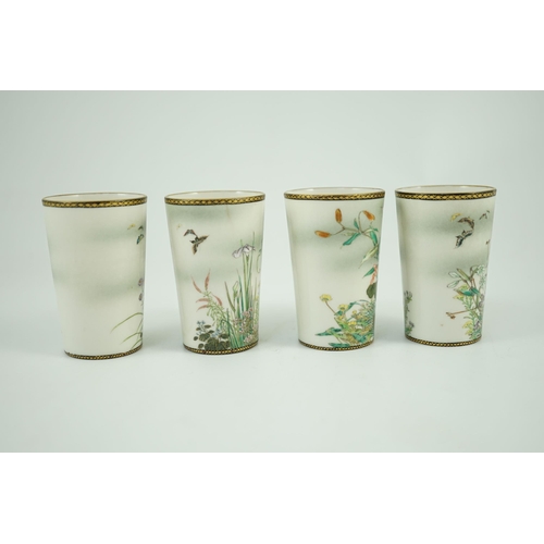 130 - A set of four Japanese porcelain small cups, by Kinkozan, Meiji period, finely painted in Satsuma st... 