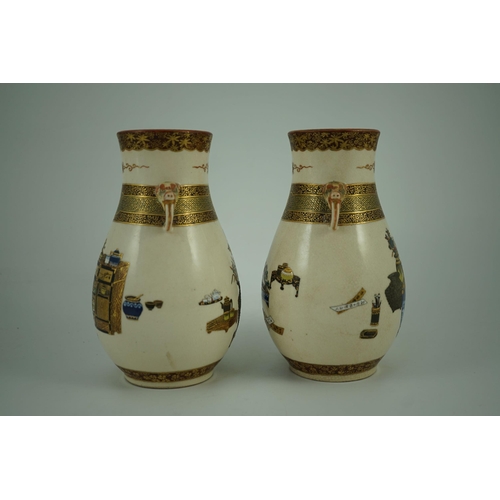 131 - A pair of Japanese Satsuma pottery vases, by Bizan, Meiji period, of pear shape applied with a pair ... 