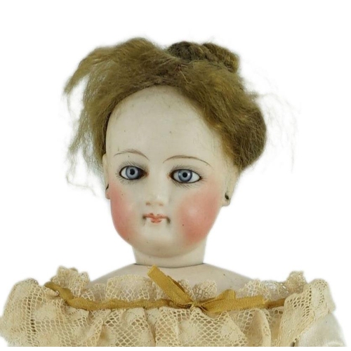 14 - An S.G. bisque shoulder head French fashion doll c.1875, cork pate mohair wig attached, swivel neck,... 