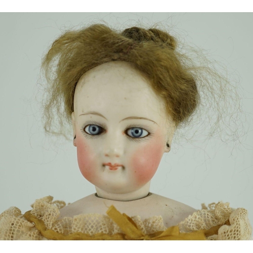 14 - An S.G. bisque shoulder head French fashion doll c.1875, cork pate mohair wig attached, swivel neck,... 