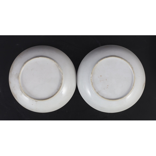 142 - A pair of Chinese export European subject saucer dishes, Qianlong period, each painted with European... 