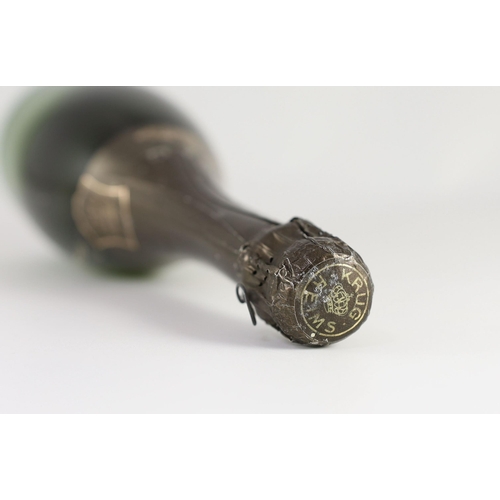 15 - A bottle of Krug 1979 vintage champagne, 32cm high