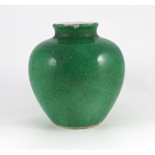 151 - A Chinese green glazed ovoid jar, 18th/19th century on a ring shaped unglazed foot, 21.5cm high... 