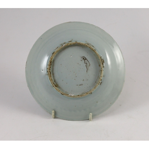 153 - A Chinese blue and white crane and pine dish, Transitional period, 15.7 cm diameter