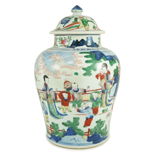 157 - A Chinese Transitional wucai 'boys' vase and cover, c.1640, painted with ladies watching over boys p... 