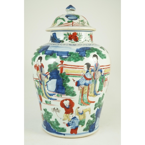 157 - A Chinese Transitional wucai 'boys' vase and cover, c.1640, painted with ladies watching over boys p... 