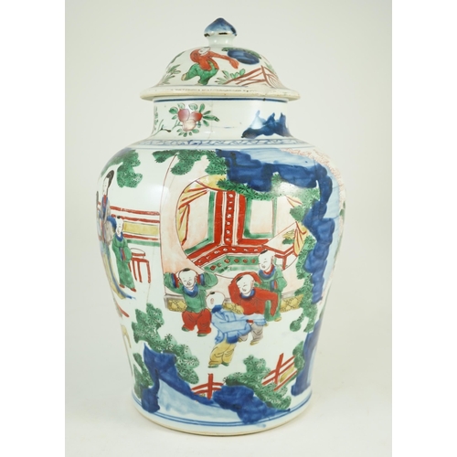 157 - A Chinese Transitional wucai 'boys' vase and cover, c.1640, painted with ladies watching over boys p... 