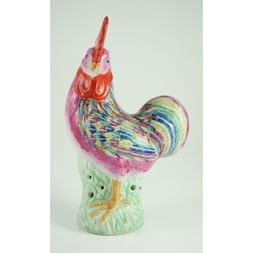 169 - A Chinese enamelled porcelain model of a rooster, Jiaqing period, 29cm high, restoration