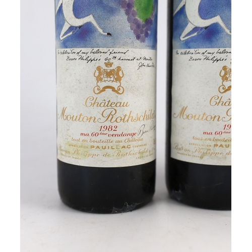 17 - Two bottles of Chateau Mouton Rothschild 1982, height 30cm