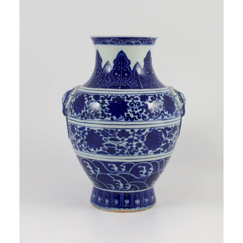 170 - A Chinese archaistic blue and white vase, hu, Qianlong seal script mark but 19th century, finely pai... 