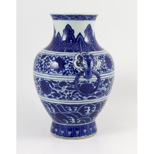 170 - A Chinese archaistic blue and white vase, hu, Qianlong seal script mark but 19th century, finely pai... 