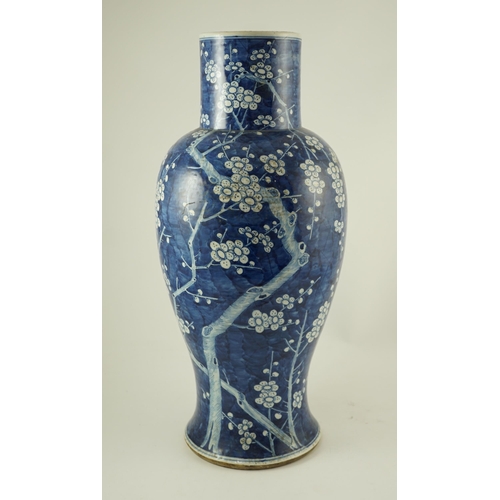 173 - A large Chinese blue and white prunus vase, 19th century, 55 cm high, drilled hole to base