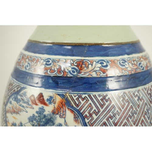 175 - A Chinese underglaze blue and copper red vase, Xuande mark, 19th century, the brown glazed neck appl... 