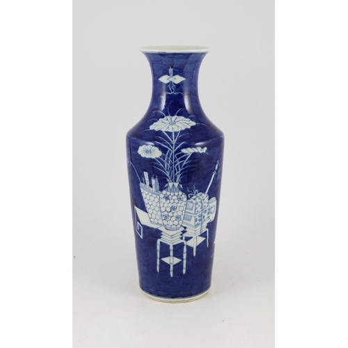 180 - A Chinese blue and white 'Antiques' vase, early 20th century, painted with vessels and furniture on ... 