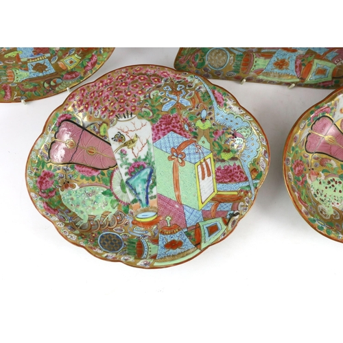 181 - A Chinese famille rose part dessert service, Daoguang period (1821-50), each piece richly enamelled ... 