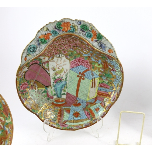 181 - A Chinese famille rose part dessert service, Daoguang period (1821-50), each piece richly enamelled ... 