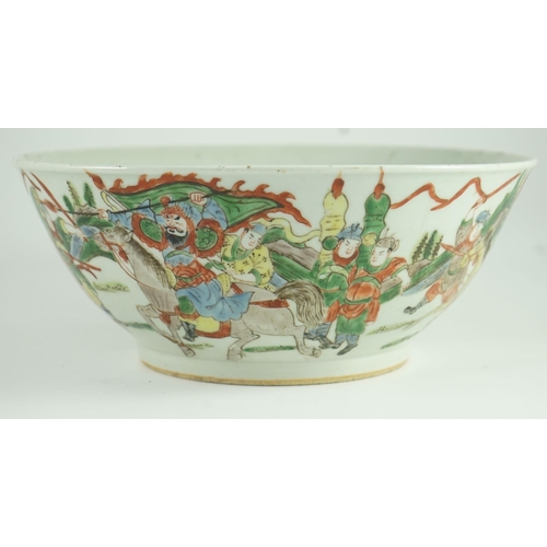 183 - A Chinese famille verte warriors bowl, 19th century, The exterior painted with a battle scene with... 