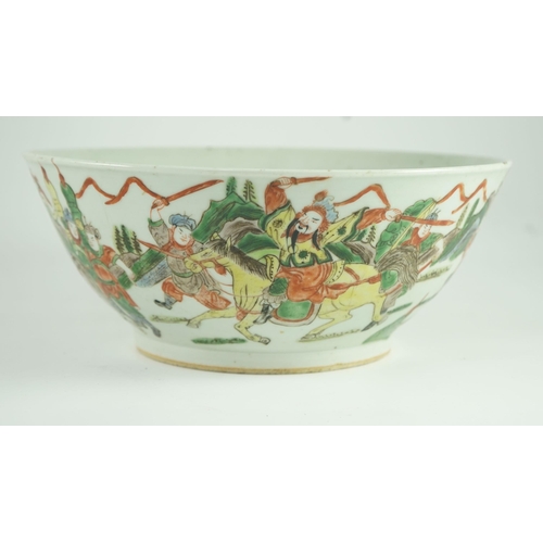 183 - A Chinese famille verte warriors bowl, 19th century, The exterior painted with a battle scene with... 