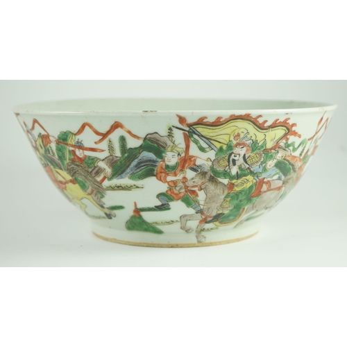 183 - A Chinese famille verte warriors bowl, 19th century, The exterior painted with a battle scene with... 