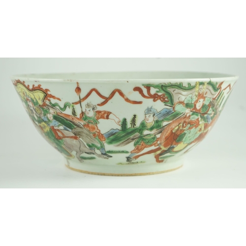 183 - A Chinese famille verte warriors bowl, 19th century, The exterior painted with a battle scene with... 