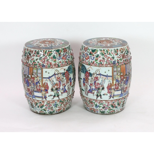 184 - A pair of Chinese famille rose barrel garden seats, late 19th century each painted to rectangular re... 