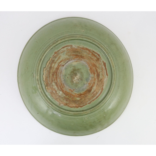 189 - A rare large Chinese Ming Longquan celadon dish, 14th century, the centre carved with lotus flowers,... 