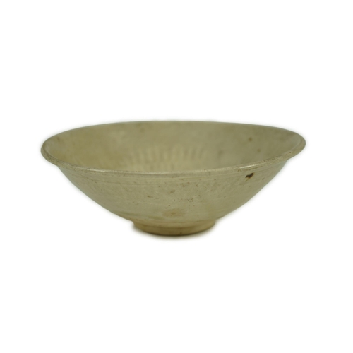 190 - A Chinese Ding ware bowl, Song dynasty, the interior moulded with chrysanthemum petals 16.5 cm diame... 