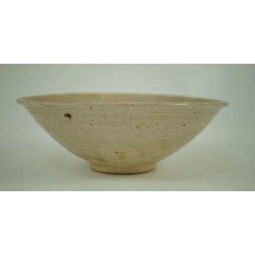 190 - A Chinese Ding ware bowl, Song dynasty, the interior moulded with chrysanthemum petals 16.5 cm diame... 