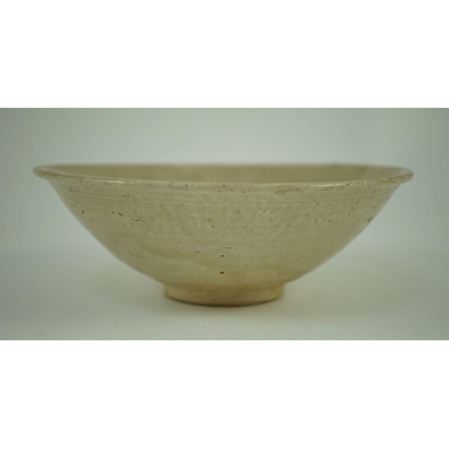 190 - A Chinese Ding ware bowl, Song dynasty, the interior moulded with chrysanthemum petals 16.5 cm diame... 