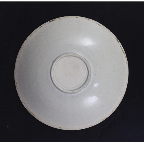 192 - A Chinese Qingbai Phoenix moulded dish, Yuan dynasty, the central medallion moulded with twin Phoe... 