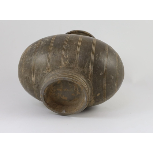 196 - A Chinese black pottery cocoon-shaped jar, Western Han dynasty, (206 B.C.A.D. 9) 25cm high