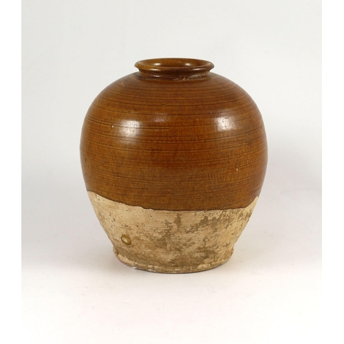 197 - A Chinese straw glazed ovoid jar, Tang dynasty 19.5cm high