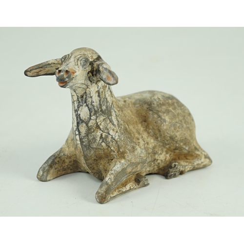 201 - A Chinese painted grey pottery model of a recumbent sheep, Han dynasty, Provenance- from the collect... 