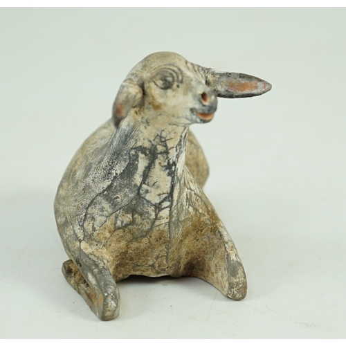 201 - A Chinese painted grey pottery model of a recumbent sheep, Han dynasty, Provenance- from the collect... 