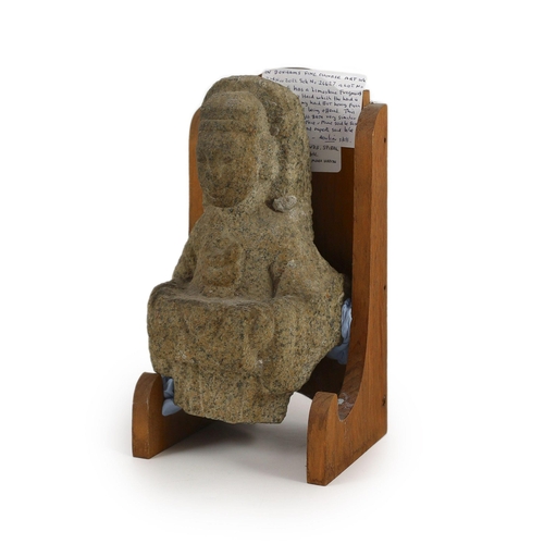 204 - A Chinese granite fragment of a Buddhist offering figure, probably Northern Wei dynasty, 22.5cm, lat... 